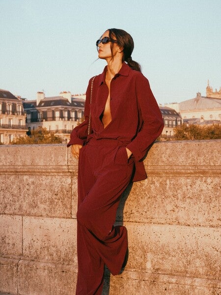 image by sofiaresing containing woman, red, wall, suit, wear